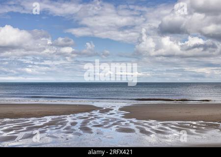 Solitude on the seashore, Norfolk beaches with big open skies, East Anglia, UK Stock Photo