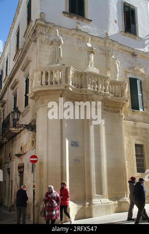 Lecce, Italy. The Propylaea entering Piazza del Duomo, with three statues of the Church Fathers. Stock Photo