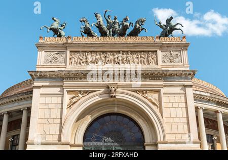 Bronze statues above the entrance of the Politeama Garibaldi theater in Palermo, Sicily, Italy Stock Photo