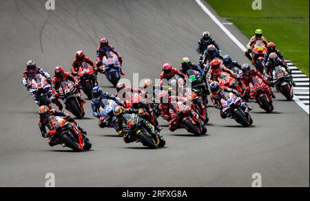Red Bull KTM Factory Racing's Jack Miller (48) leads into the first corner during the Monster Energy British Grand Prix 2023 at Silverstone, Towcester. Picture date: Sunday August 6, 2023. Stock Photo