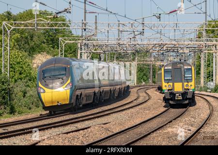 Wolverton Milton Keynes, May 27, 2023:Trains on WCML near Wolverton Station on 27MAY23 Avanti Class 390 No 390046 on the 1H16 London Euston to Manches Stock Photo