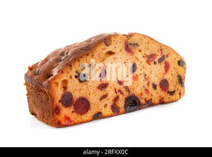 Christmas fruit cake in front of white background Stock Photo