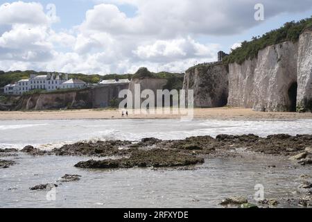 Kent UK. 06th August 2023. UK Weather. Strong  winds can be felt and choppy sea water seen at Kent south coast while Storm Antoni hits England' south west coast with near-80mph gusts. People still enjoying sunny day on beach swimming in incoming waves. Credit: xiu bao/Alamy Live News Stock Photo