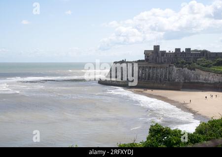 Kent UK. 06th August 2023. UK Weather. Strong  winds can be felt and choppy sea water seen at Kent south coast while Storm Antoni hits England' south west coast with near-80mph gusts. People still enjoying sunny day on beach swimming in incoming waves. Credit: xiu bao/Alamy Live News Stock Photo