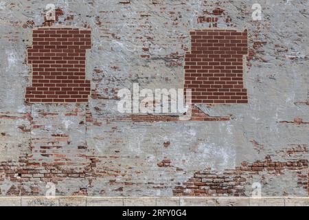 Brick background abstract taken from an old, worn, and used factory. Stock Photo