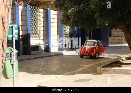 A classic BMW Isetta on a street in Italy Stock Photo