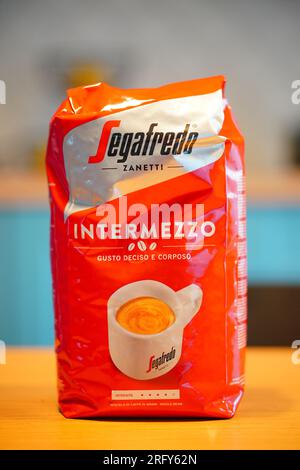 Poznan, Poland - August 6, 2023: Segafredo Intermezzo coffee beans in a bag on table Stock Photo