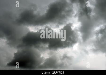 Dramatic storm clouds before a thunder-storm. Dark moody view Stock Photo