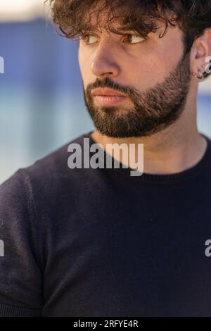 Close-up portrait of a bearded man looking sideways Stock Photo