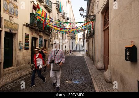 Strolling the charming streets of Lisbon, where every corner unveils architectural wonders and iconic attractions, capturing the city's vibrant essenc Stock Photo