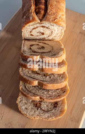 Homemade freshly baked bread sliced and on table ready to eat, healthy and tasty Stock Photo
