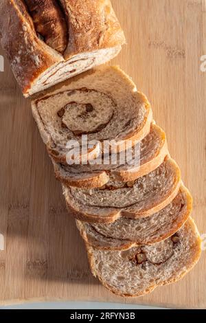 Homemade freshly baked bread sliced and on table ready to eat, healthy and tasty Stock Photo