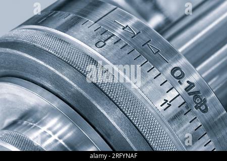 Lathe control knobs close up blue tone. Metal machine tools industry. The metalworking process by turning machine. machinery industry metal processing Stock Photo