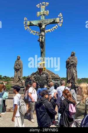 Prague, CZ - June 3, 2023 Vertical view of controversial Statuary of the Holy Crucifix and Calvary, an outdoor sculpture by Emanuel Max, installed on Stock Photo
