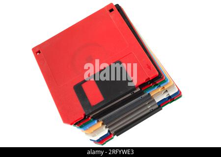 Colored old retro floppy diskettes in stack. Isolated on white background. Stock Photo