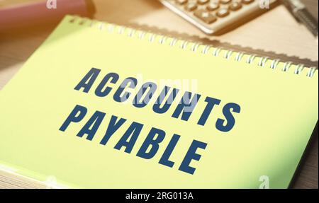 Notes with the word Accounts payable. Money owed by a business to its suppliers shown as a liability on a company's balance sheet. AP. Business and fi Stock Photo