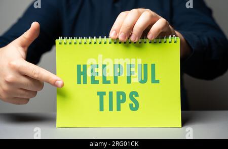 Helpful tips on notes in male hands. Business concept. Strategy, plan, planning. useful tips Stock Photo