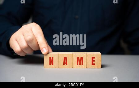 Brand Names Inscription Name inscription on wooden blocks concept. Creation of a new personal ...
