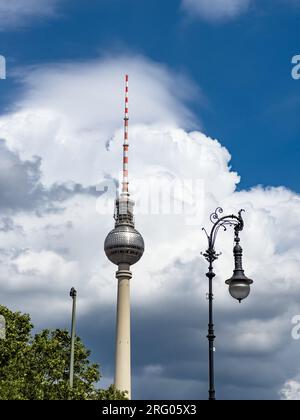 BERLIN, GERMANY - JULY 22, 2023: Alexanderplatz TV tower on the beautiful blue sky background with  clouds. Stock Photo