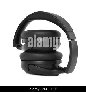 Modern black wireless headphones isolated on white Stock Photo
