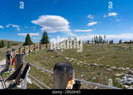 Leading lines of posts and rope encircle Native American Indian ...