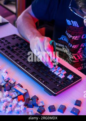 Building Custom Keyboard with blue switches Stock Photo