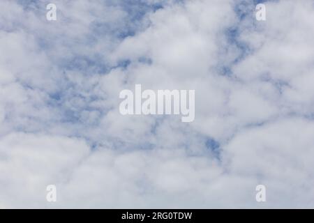 Sunshine clouds sky during morning background. Blue,white pastel heaven,soft focus lens flare sunlight. Abstract blurred cyan gradient of peaceful nat Stock Photo