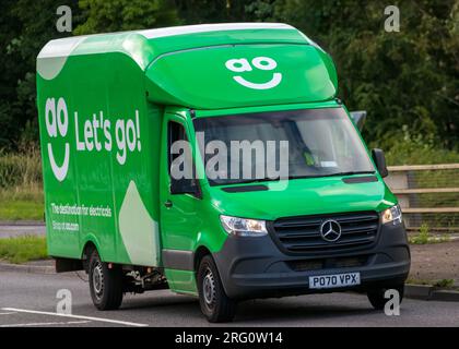 Milton Keynes,UK - July 28th 2023:  2020 Mercedes Sprinter van as an AO delivery van travelling on an English road Stock Photo