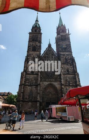 Nuremberg, Germany - July 19, 2023: View of St. Lorenz Church in historical center of Nurnberg, Franconia, Bavaria  Stock Photo