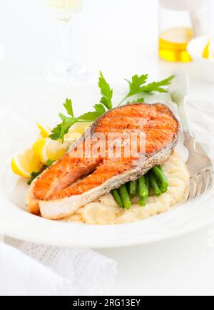 Salmon with celeriac puree and green bean Stock Photo