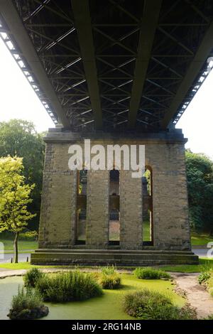 Underneath Valley Bridge in Scarborough with pond in foreground Stock Photo