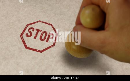 Stop stamp and stamping hand. Blocked and ban concept. Stock Photo