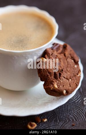 Chocolate and hazelnuts cookies with coffee Stock Photo