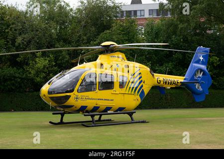 North West Air Ambulance on a bowling green. Greater Manchester UK Stock Photo