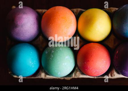 High angle close up of brightly colored Easter eggs. Stock Photo