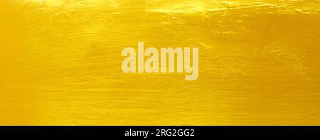 Golden cement wall background golden abstract yellow Stock Photo