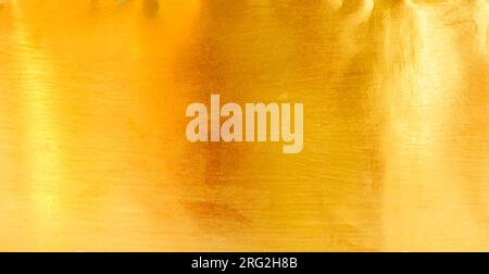 Gold metal brushed background or texture of brushed steel Stock Photo