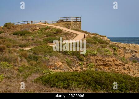 Coastal path as it passes through Punta de s'Arenella, north of the Cap de Creus cape (Alt Empordà, Girona, Catalonia, Spain) ESP: Camino de ronda Stock Photo