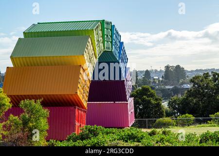 Containbow - a rainbow arch shipping container sculpture installation by Marcus Canning. Stock Photo