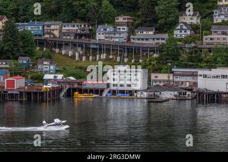 Sea plane takeoff in Ketchikan Harbor Alaska, Cityscape of Ketchikan, Alaska Stock Photo