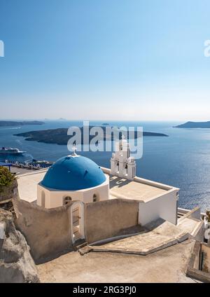 Three Bells of Fira, iconic blue domed church at dusk, Fira, Santorini ...