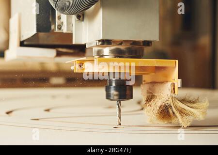 CNC router machine creates a layout of the shelf complex. Stock Photo