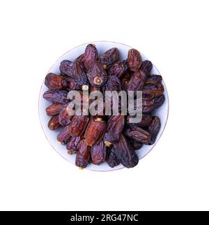 One bowl of Date fruits top view isolated on white Background Stock Photo