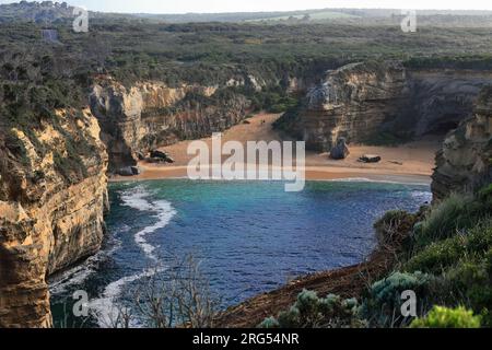 820 Loch Ard Gorge seen backwards from Island Arch Lookout, end of the Shipwreck Walk, on a calm morning. Victoria-Australia. Stock Photo