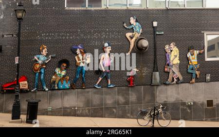 Blowers street character mural on a wall in downtown Halifax Nova Scotia Canada Stock Photo