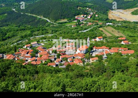 View of Crni Kal village bellow Karst edge in Primorska, Slovenia Stock Photo