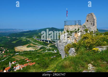 View of Crni Kal fortress at Karst Edge in Primorska, Slovenia and the viaduct on Primorska motorway Stock Photo