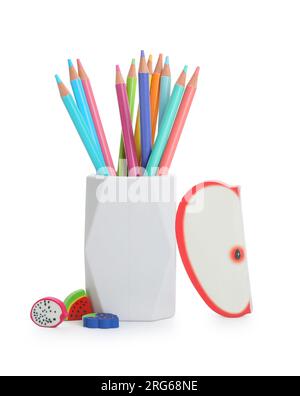 Holder with different color pencils, sticky notes and erasers on white background Stock Photo