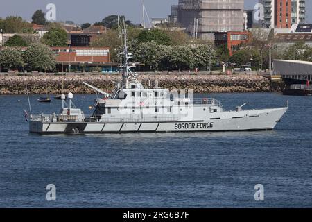 The UK Border Force customs cutter HMC SEEKER remains stationary in the harbour Stock Photo