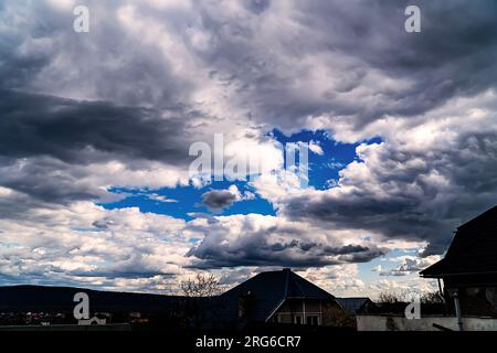 Thunder clouds gathering over the city leading into the distance ...